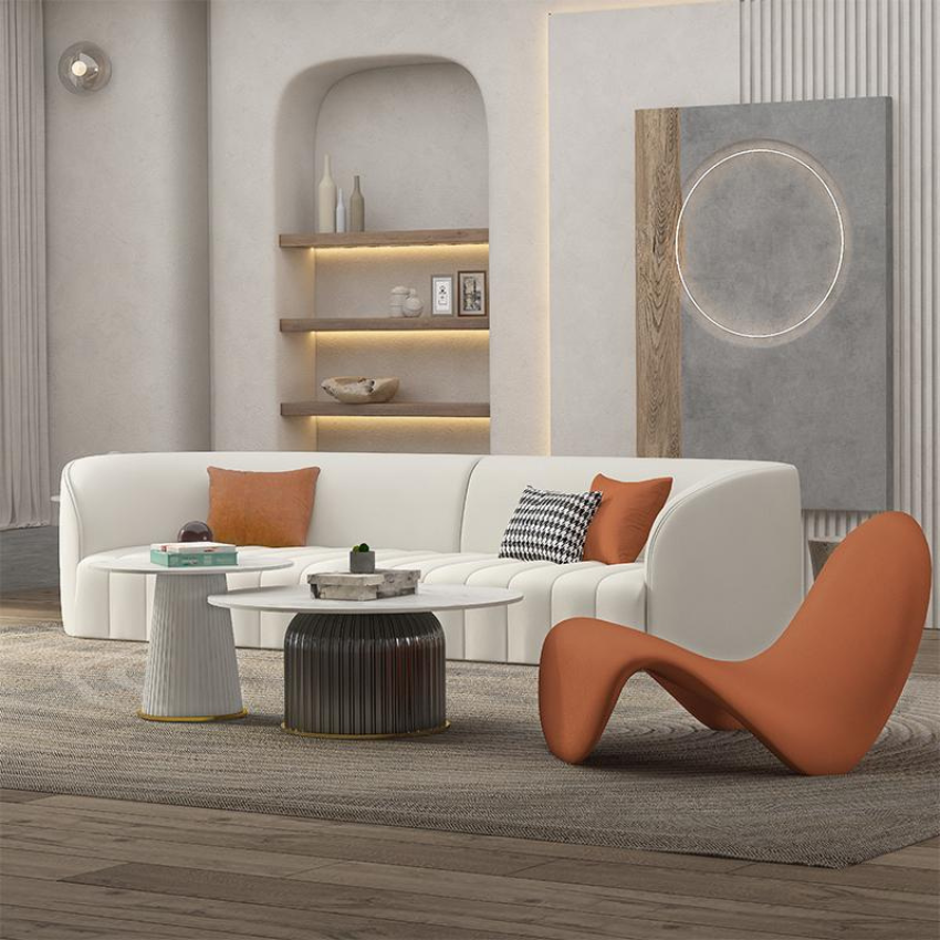 Baxter Leather Rounded Sofa with Orange Chair