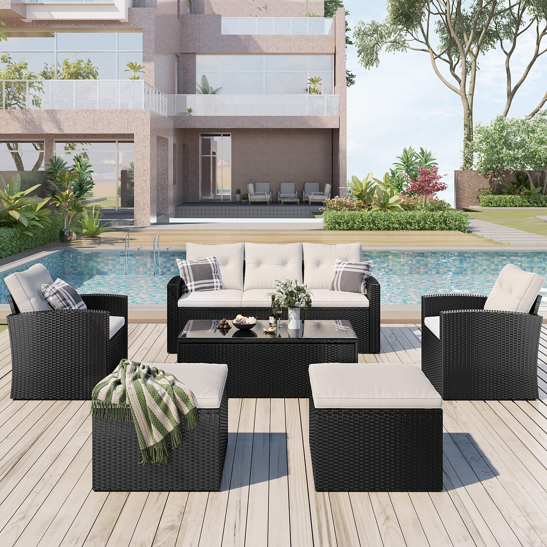Irta Wicker Outdoor Sofa, 2 Chairs, 2 Ottomans & Coffee Table Set - 7 Seat