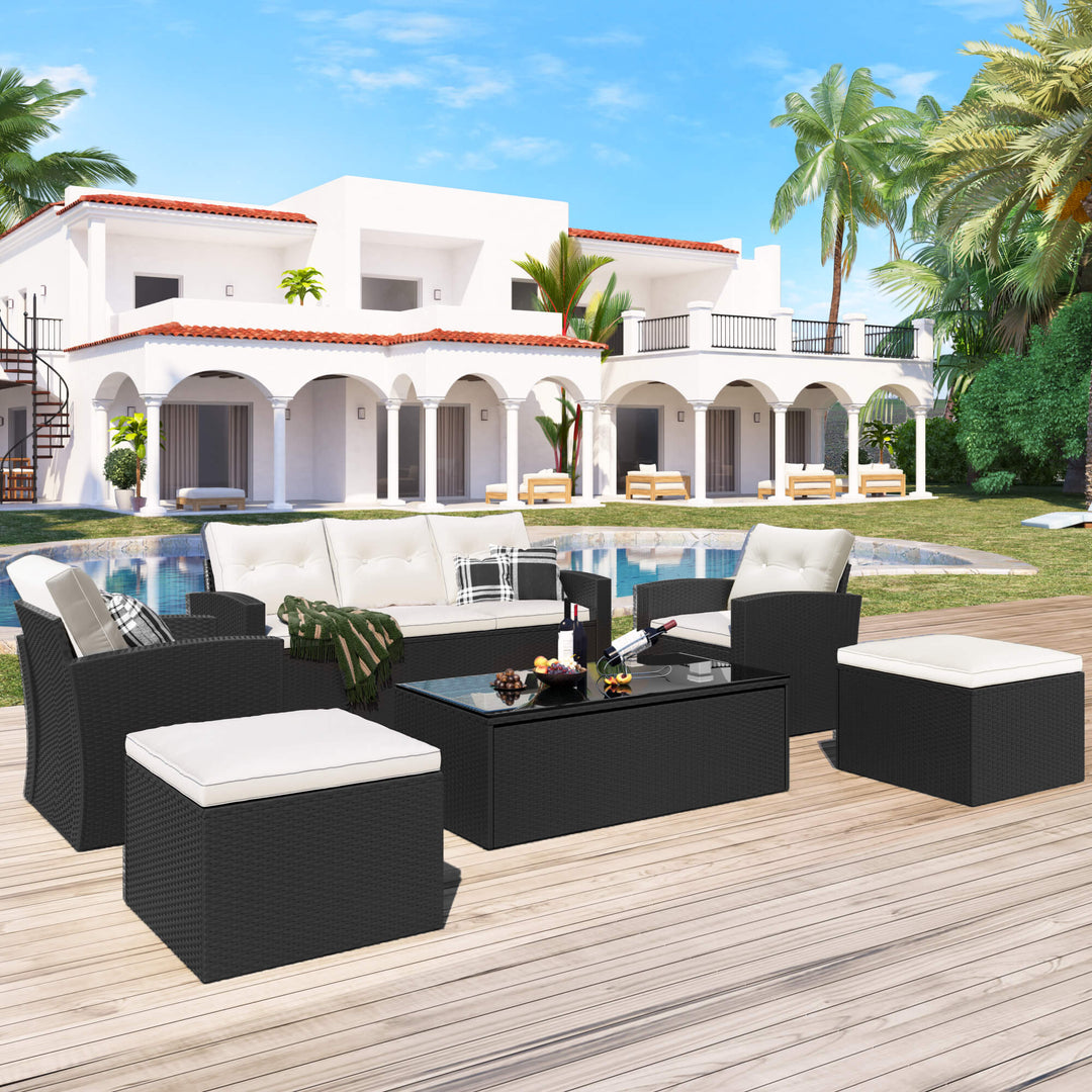 Irta Wicker Outdoor Sofa, 2 Chairs, 2 Ottomans & Coffee Table Set - 7 Seat